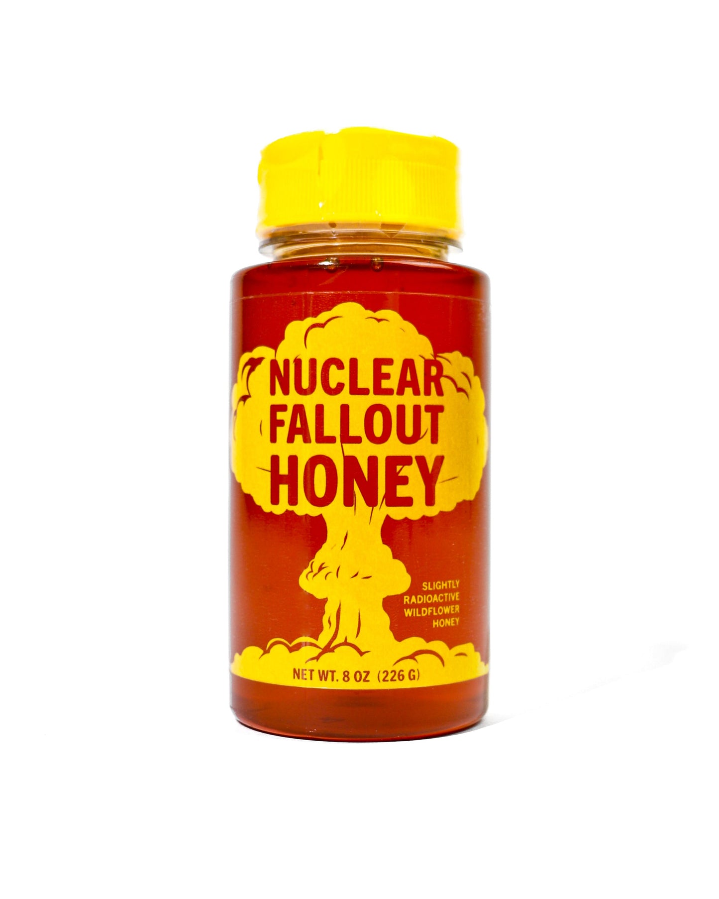 Bottle of 'Nuclear Fallout Honey' with a yellow cap on a white background