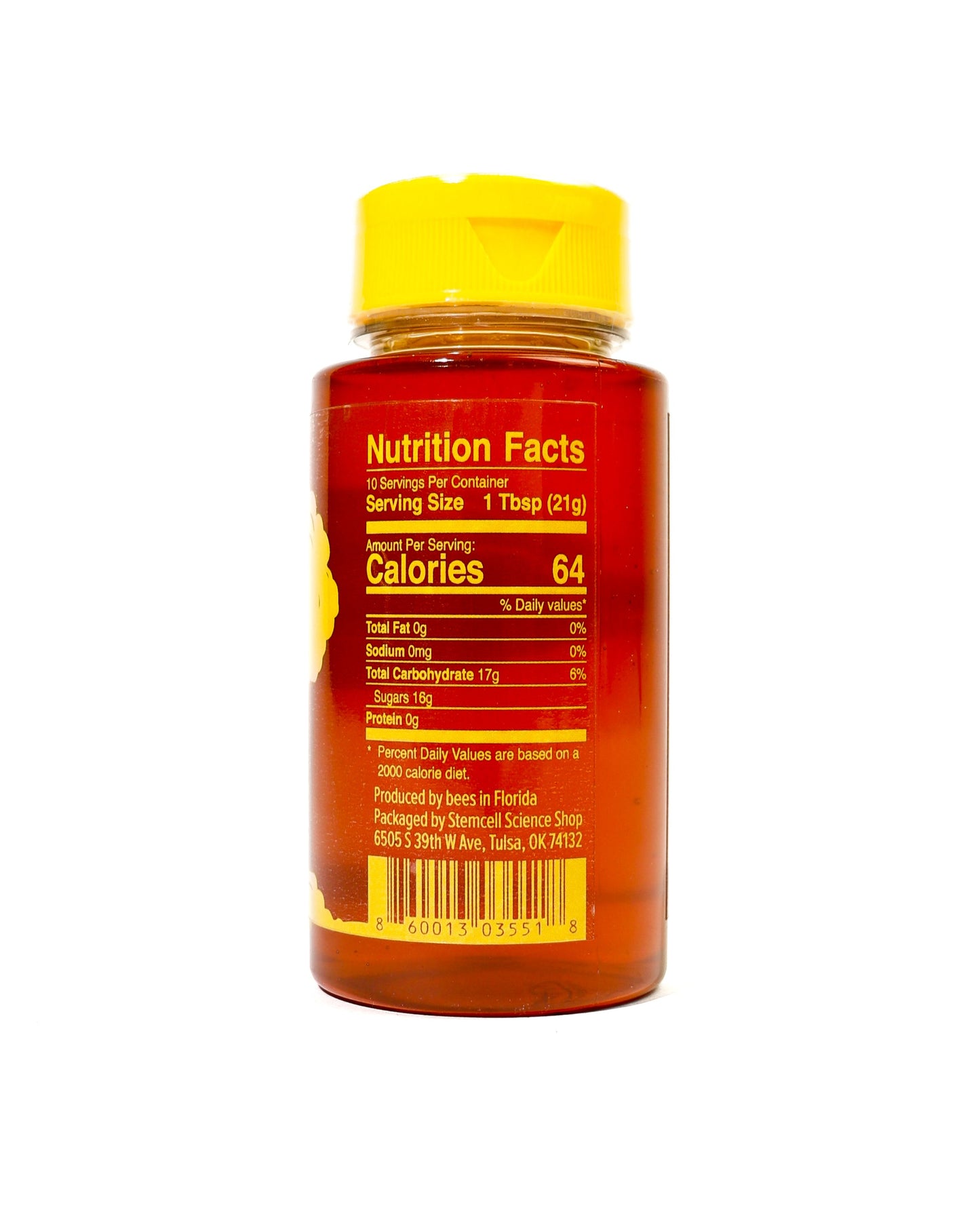 Bottle with yellow cap and nutrition label on a white background