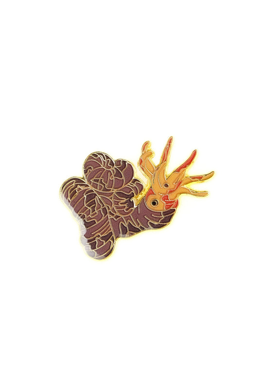 Pin with a design of a bear and antlers on a white background