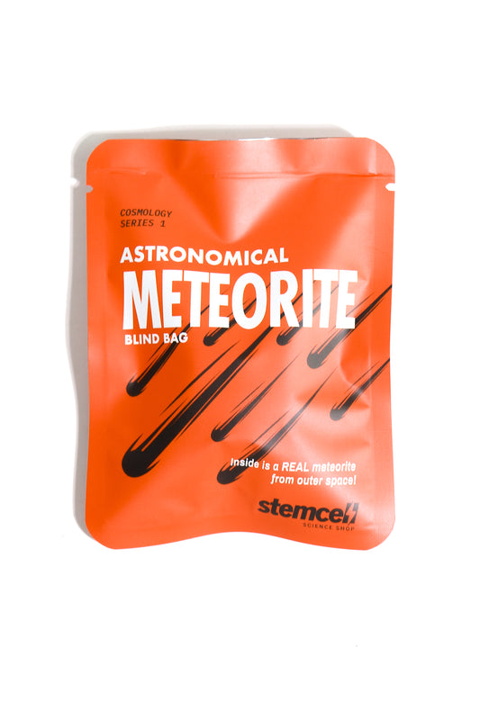 Orange packaging of 'Astronomical Meteorite' blind bag with text and branding on a white background