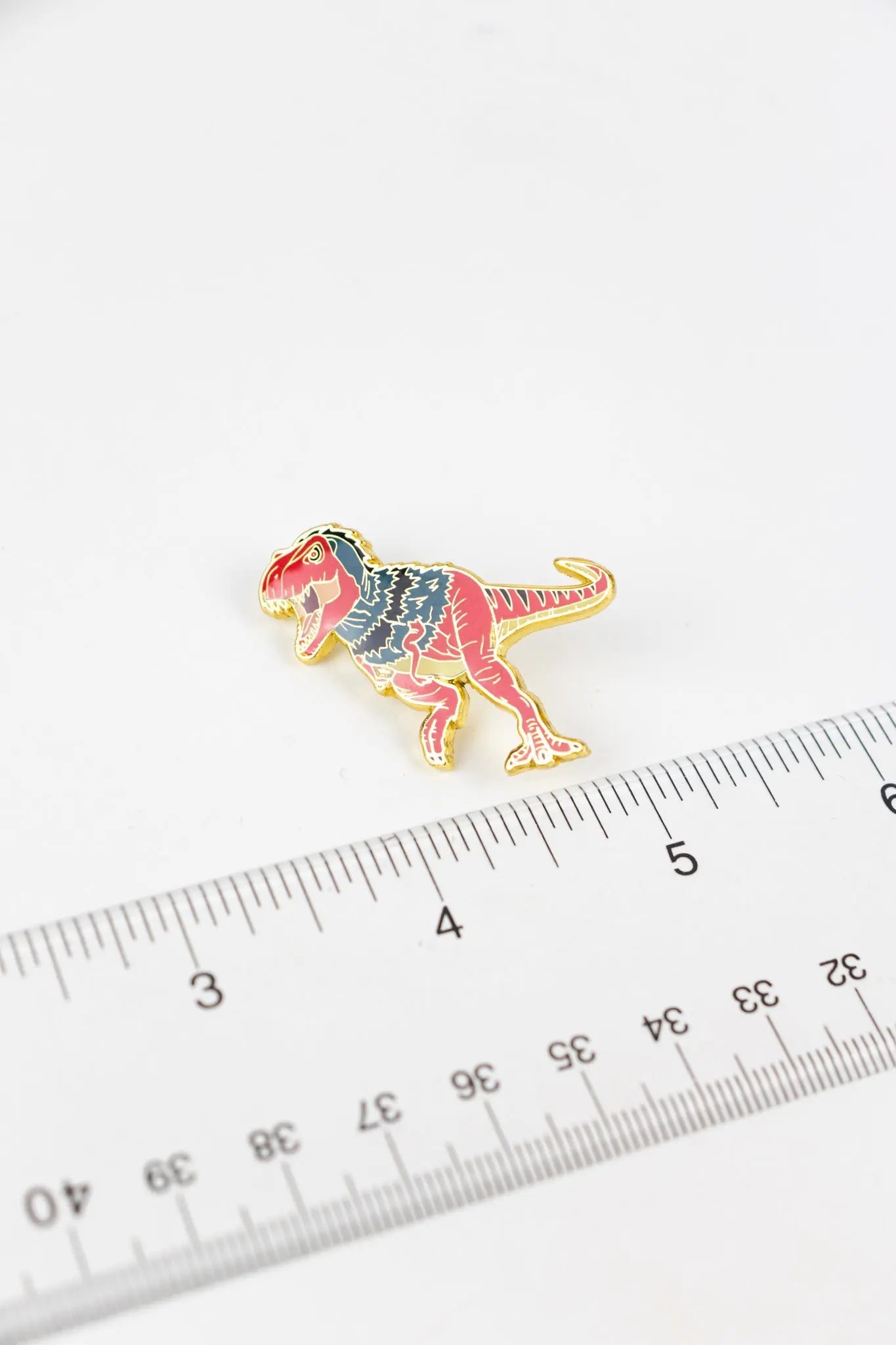 Tyrannosaurus Rex Pin with Feathers Pin Stemcell Science Shop