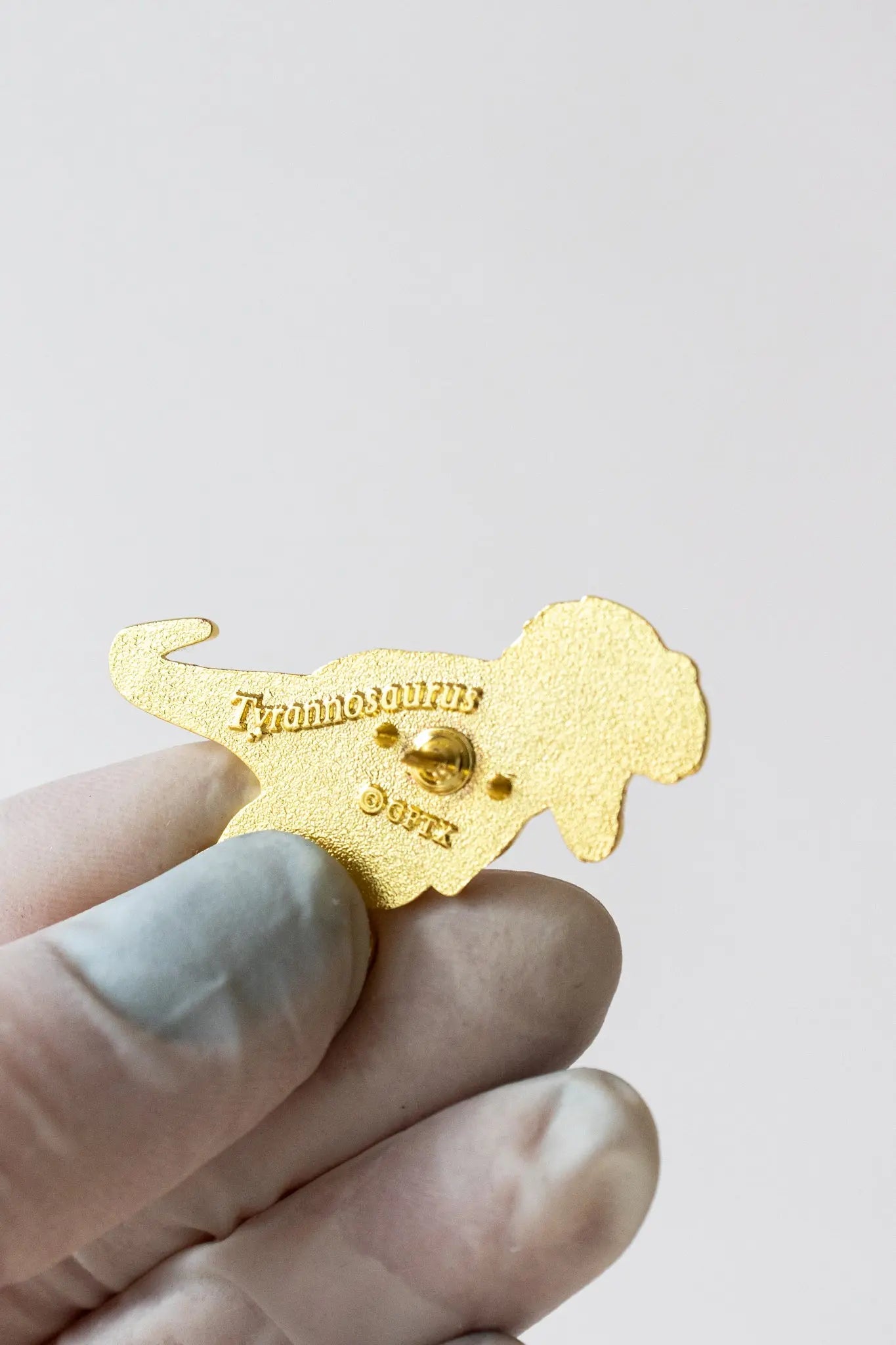 Tyrannosaurus Rex Pin with Feathers Pin Stemcell Science Shop