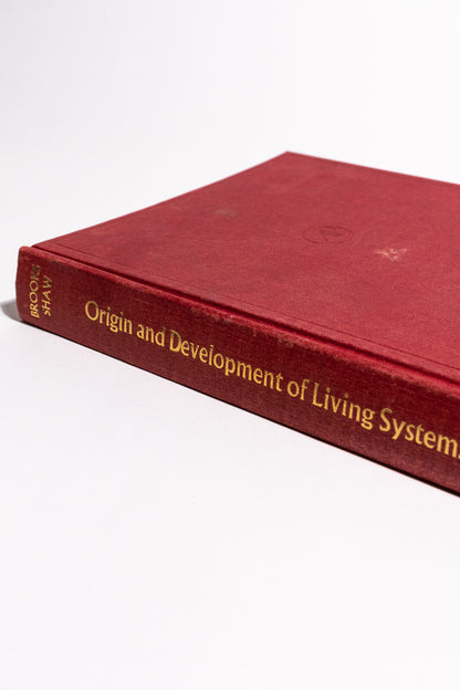 Origin and Development of Living Systems